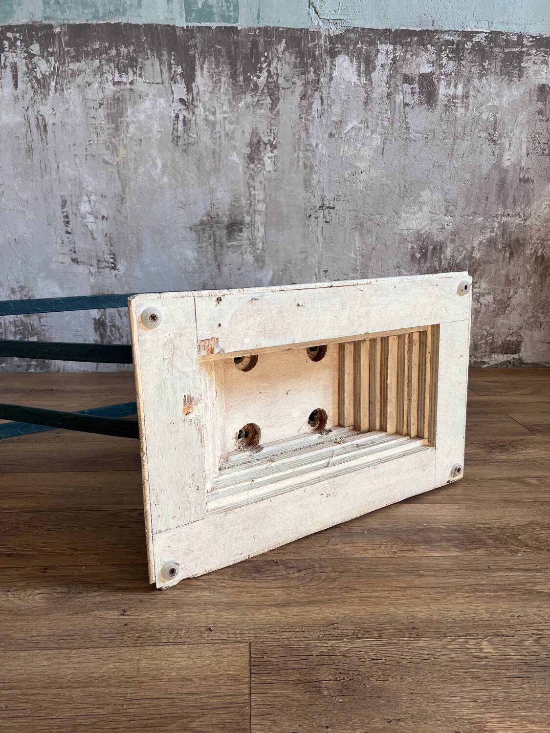 Console in glass and antique patinated metal