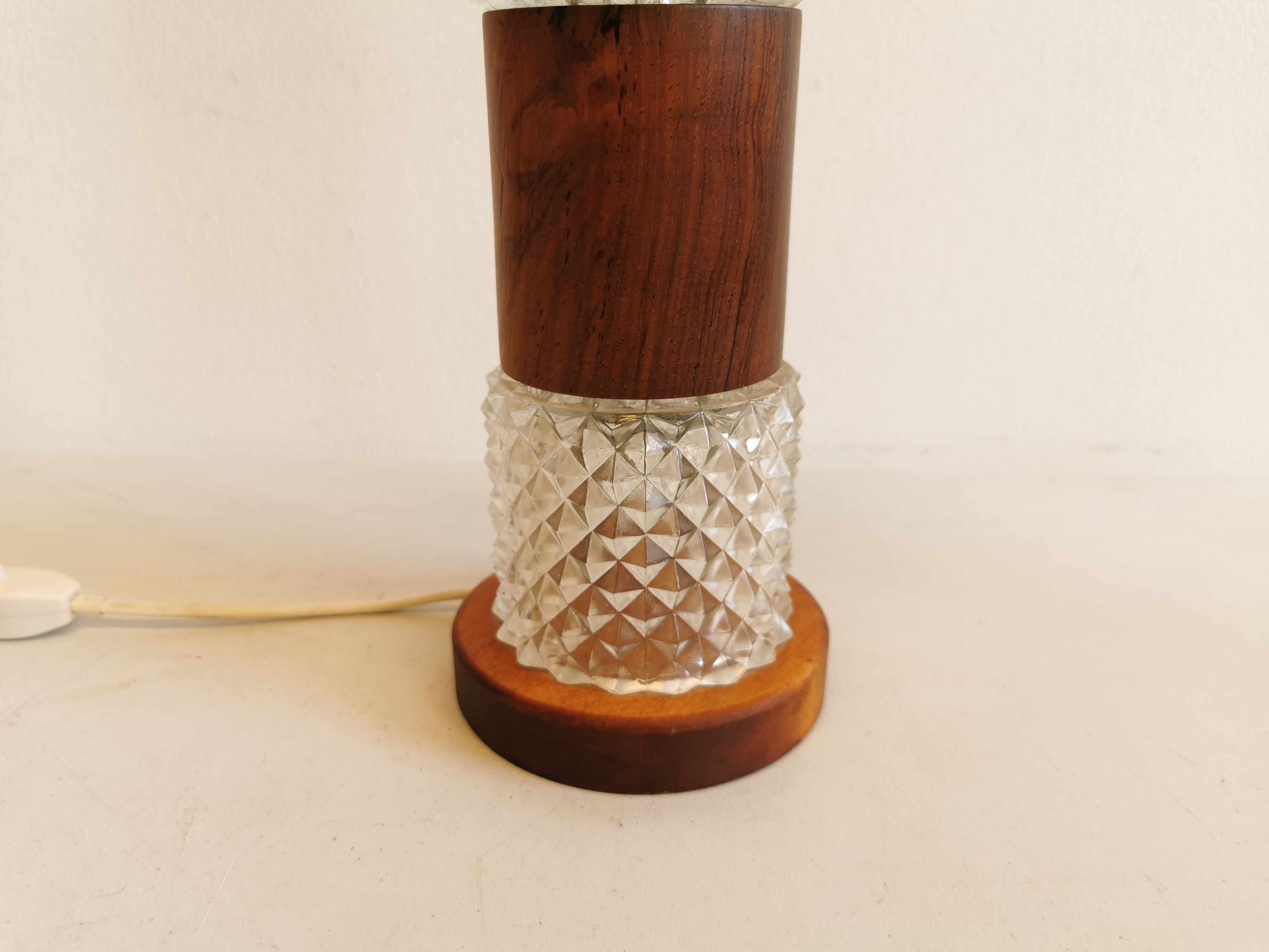 Swedish table lamp, made of what looks like rosewood and crystal glass.