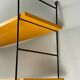 Vintage wall shelf with three wood veneer shelves