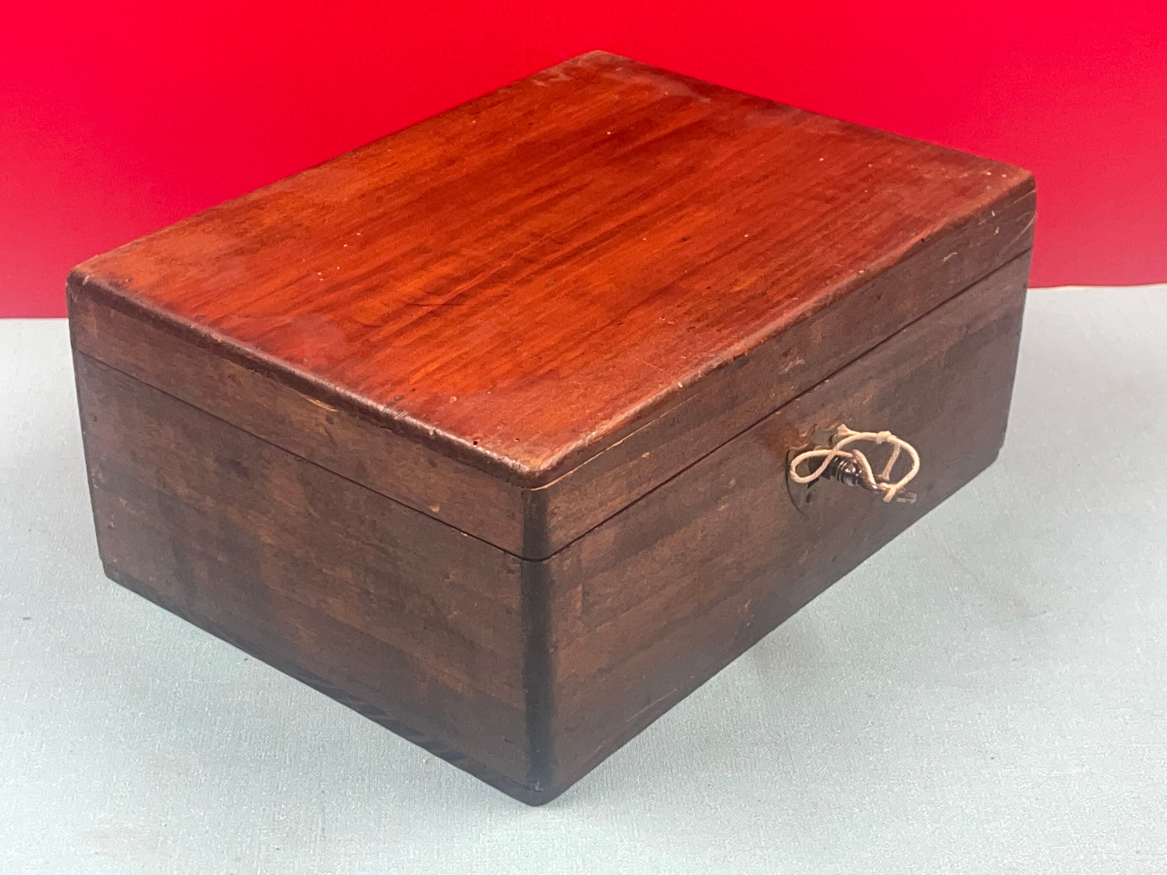 Wooden box with its key, vintage decoration