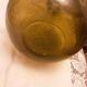 Old green glass demijeanne