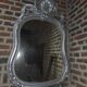 Louis xv style mirror with silver patinated shell