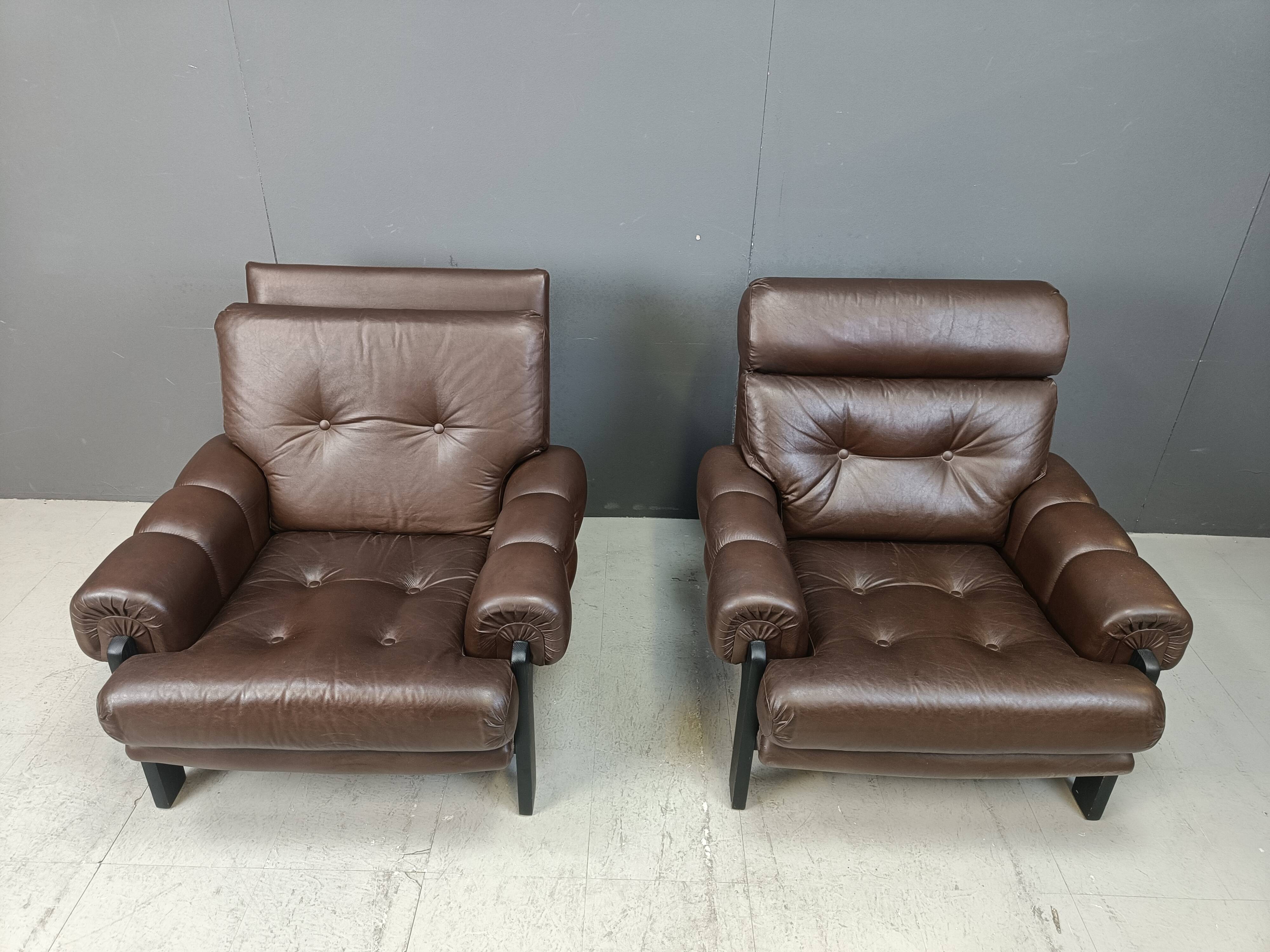 Pair of leather armchairs made in Denmark, 1960s