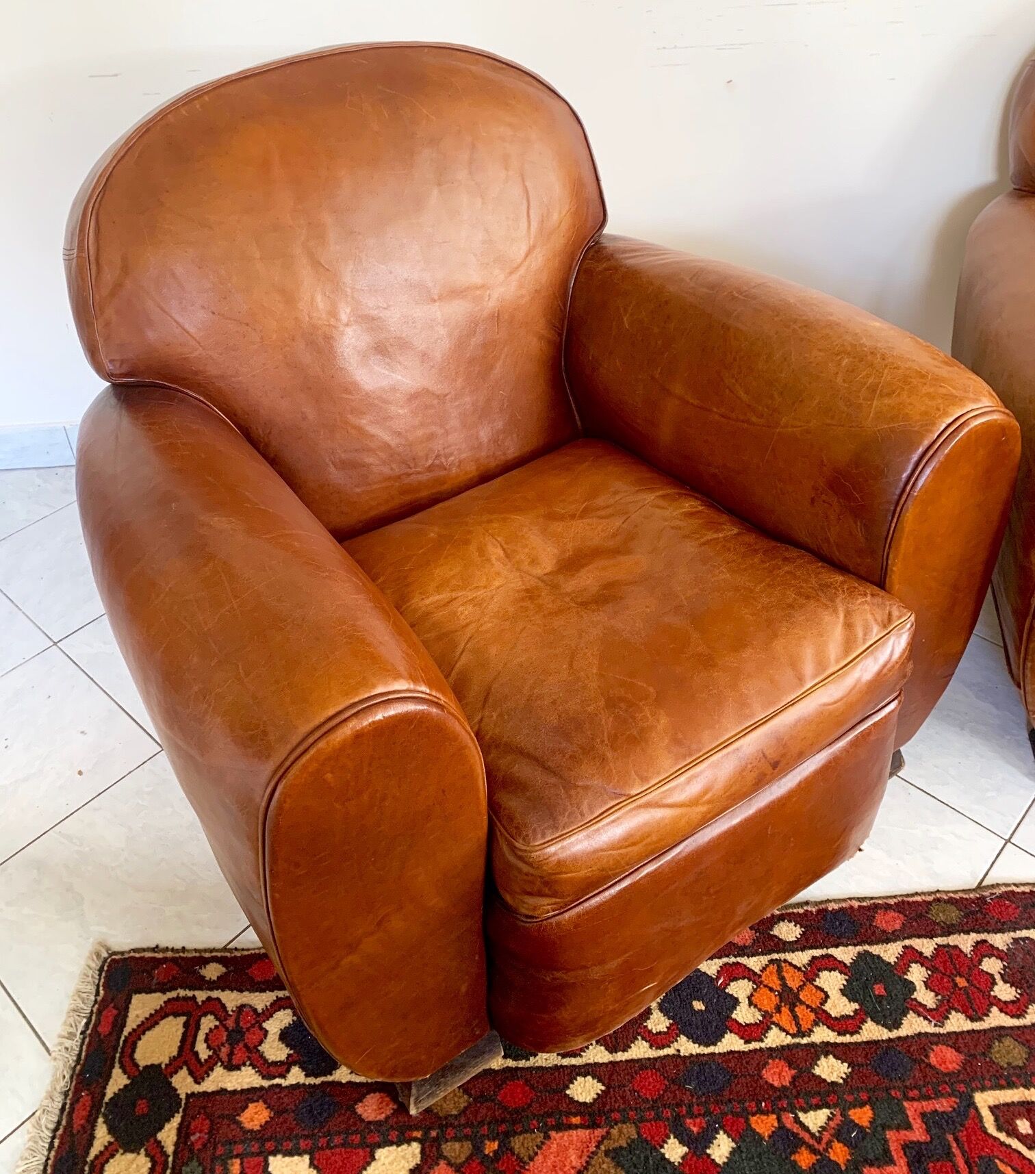 Pair of leather club chairs