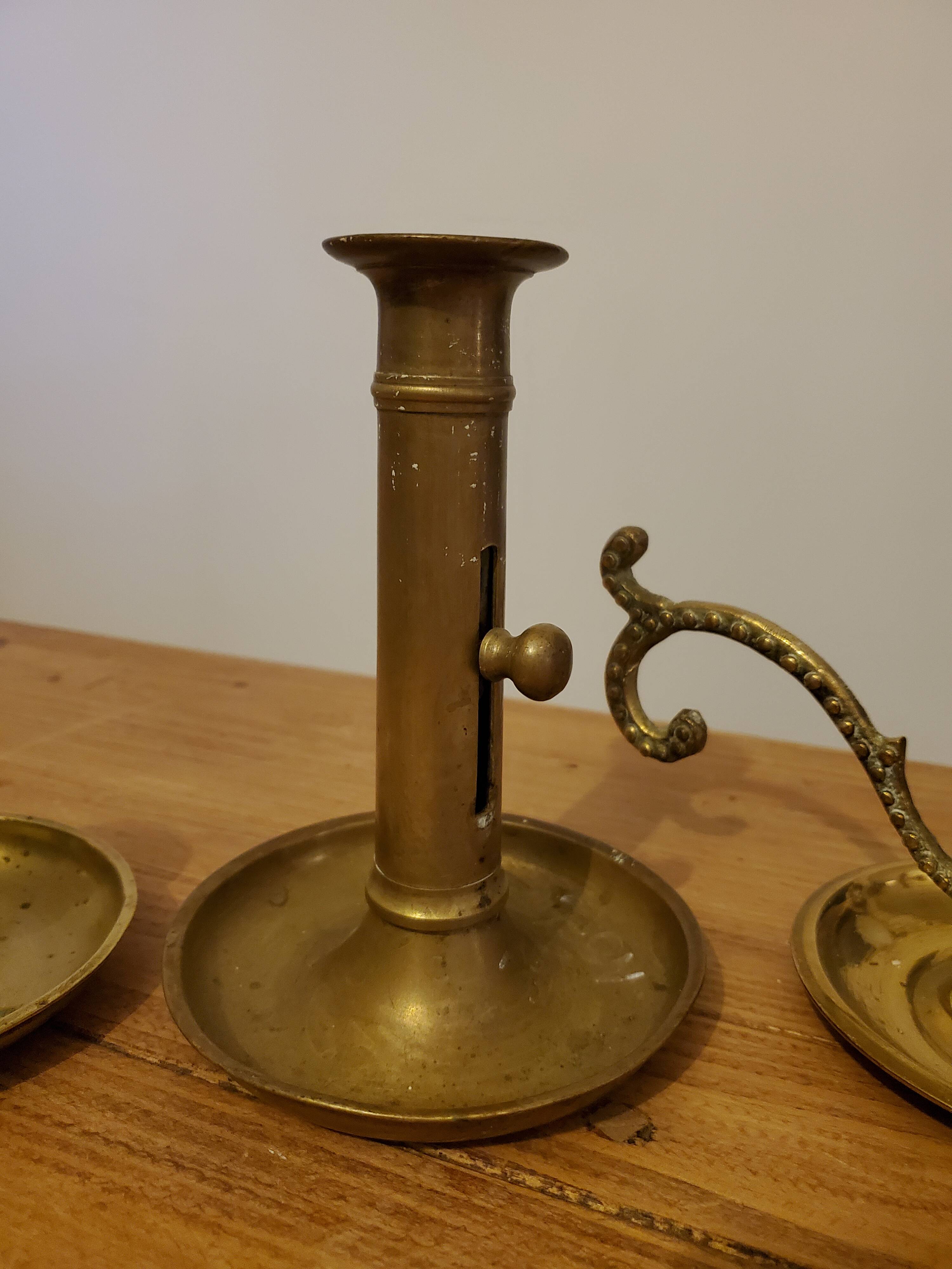 Set of brass candle holders