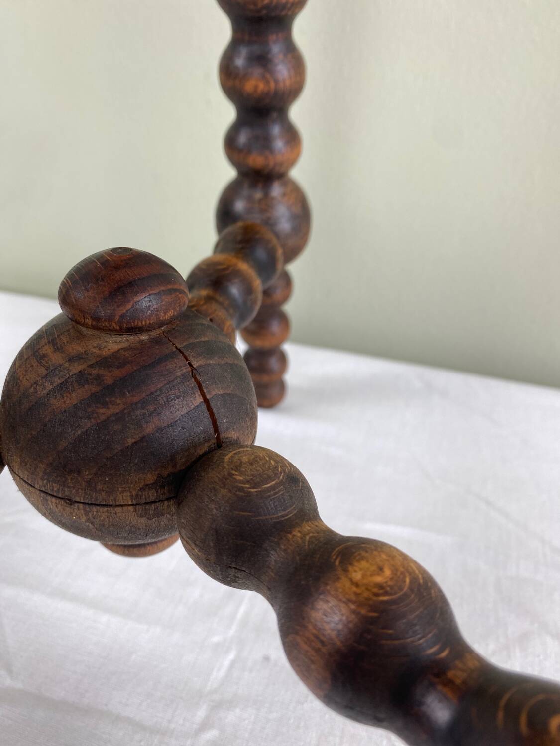 Signed turned wood tripod stool