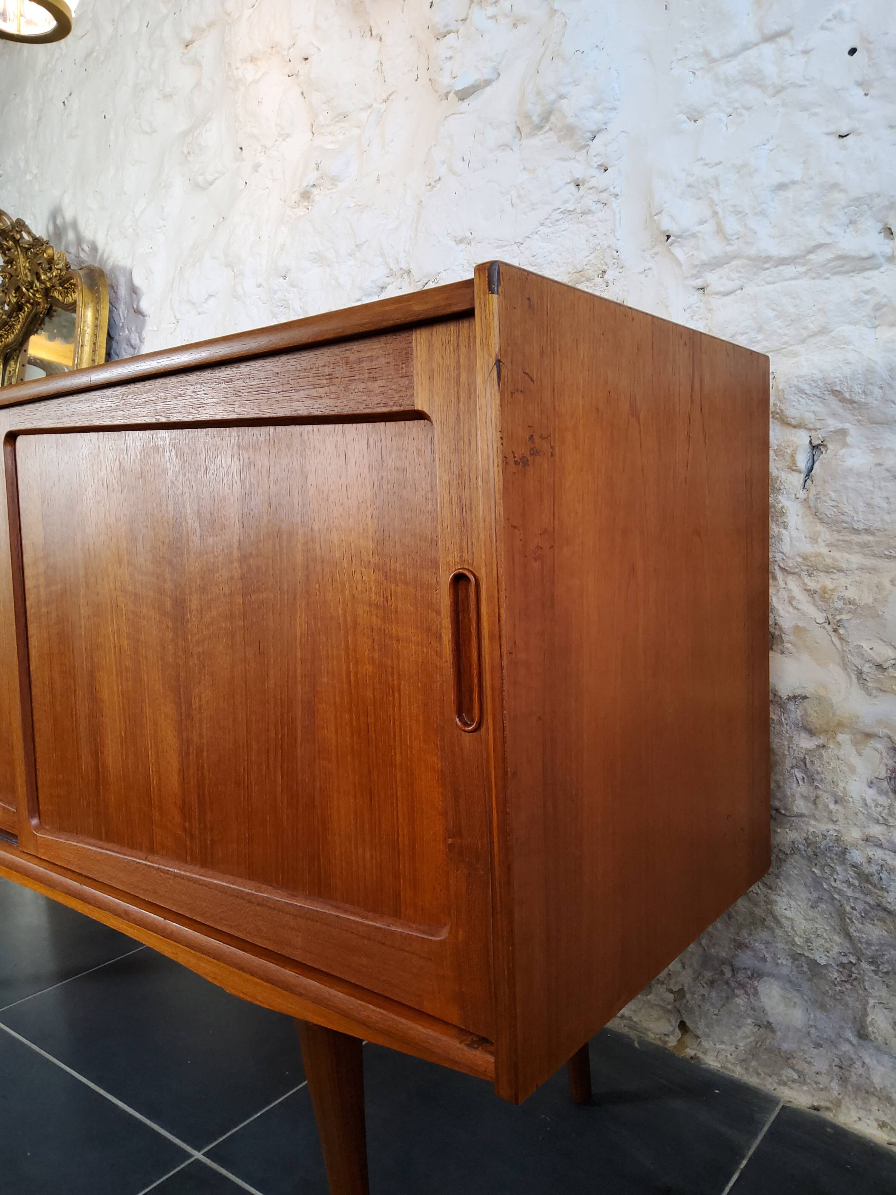 Scandinavian sideboard with sliding doors and drawers - teak