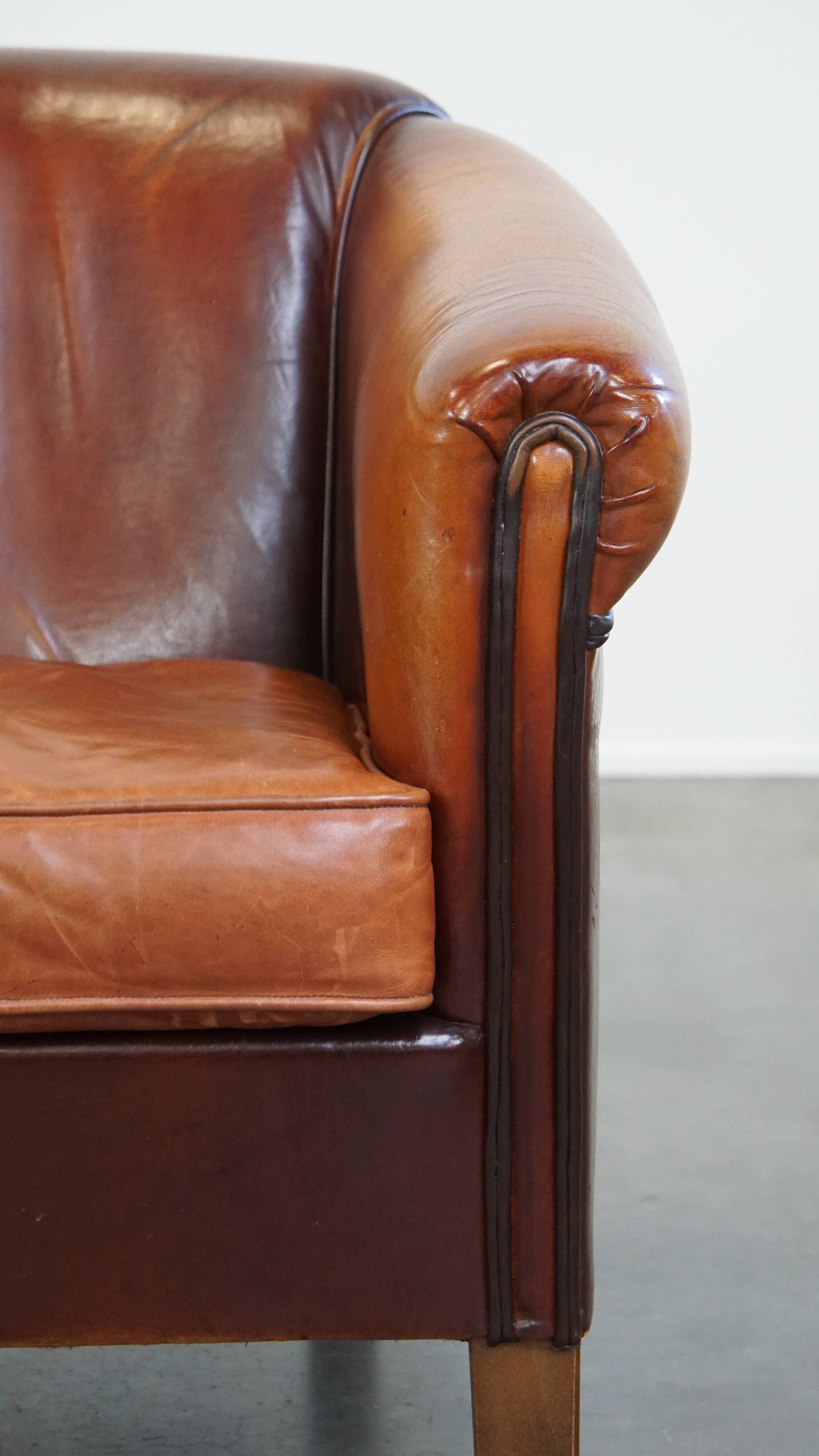 Correctly finished sheep leather club chair
