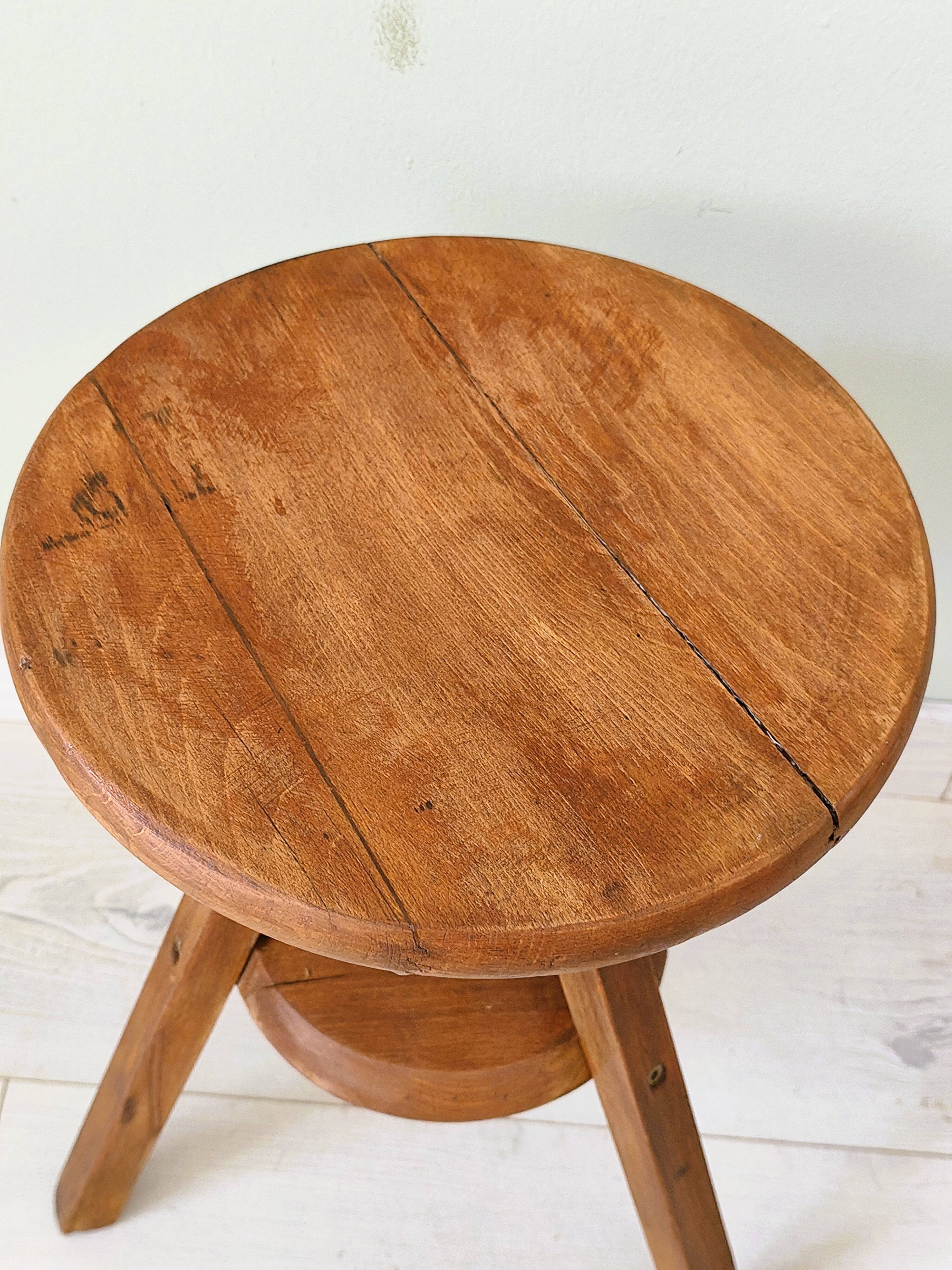 Adjustable vintage workshop stool made of solid wood