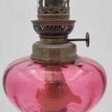 Old metal and pink glass oil lamp