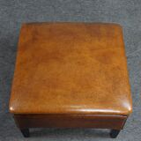 Schapenleren armchair and studio lounge stool