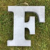 Ten letters sign in zinc material