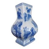 China circa 1920: porcelain vase with blue and white decoration