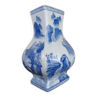 China circa 1920: porcelain vase with blue and white decoration