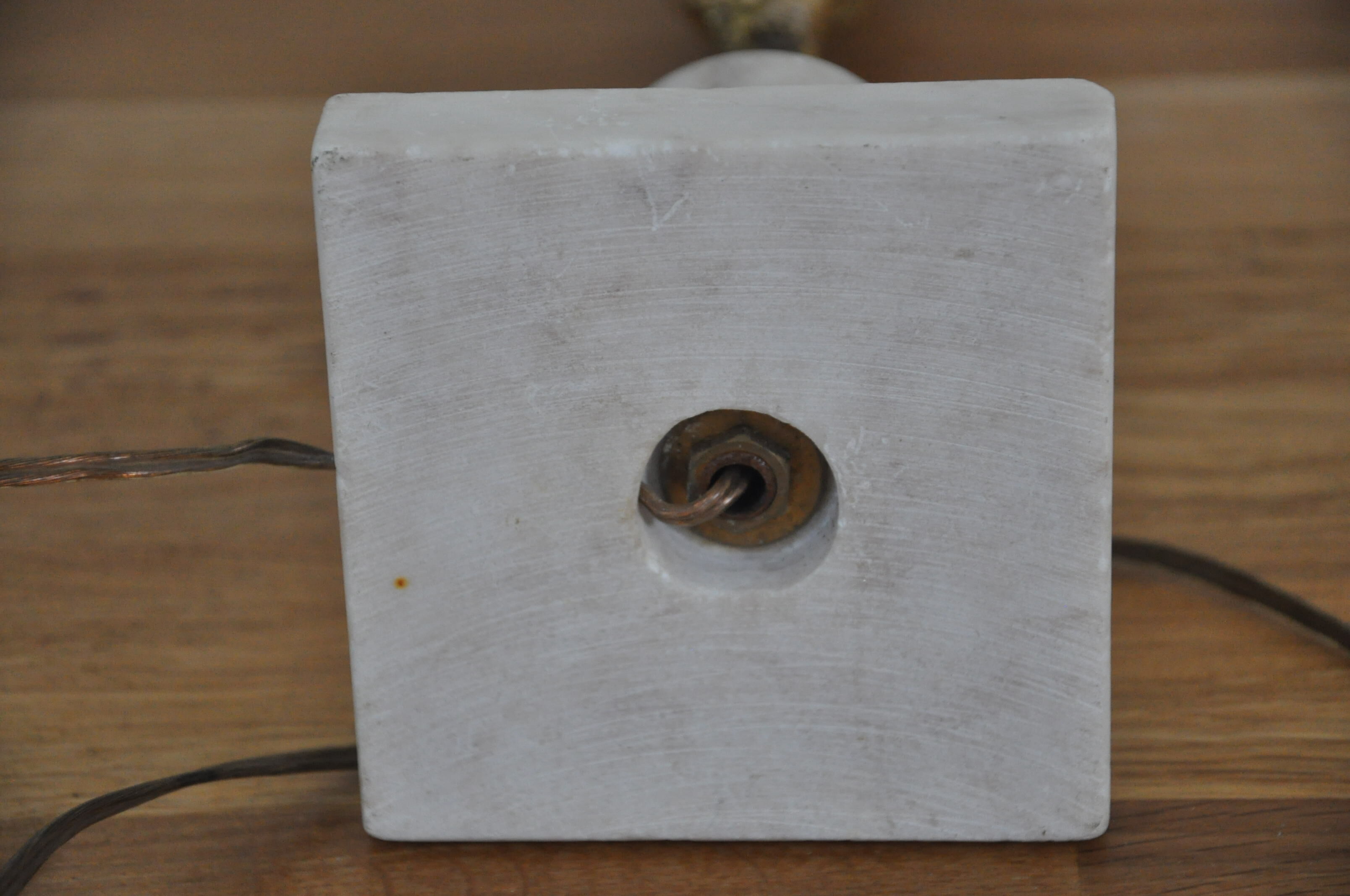 Ancient alabaster lamp and bronze cherub decoration