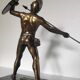 Large statue of Achilles, Greek warrior, marble base, ancient mythology.