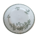 White and green ceramic dish decorated with flowers and butterflies