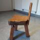 Tripod chair for children, Scandinavian brutalist chalet design.