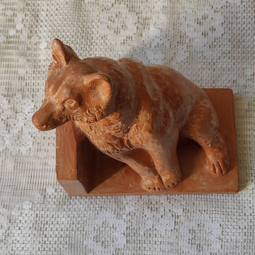 Thomas Cartier terracotta bear book holder