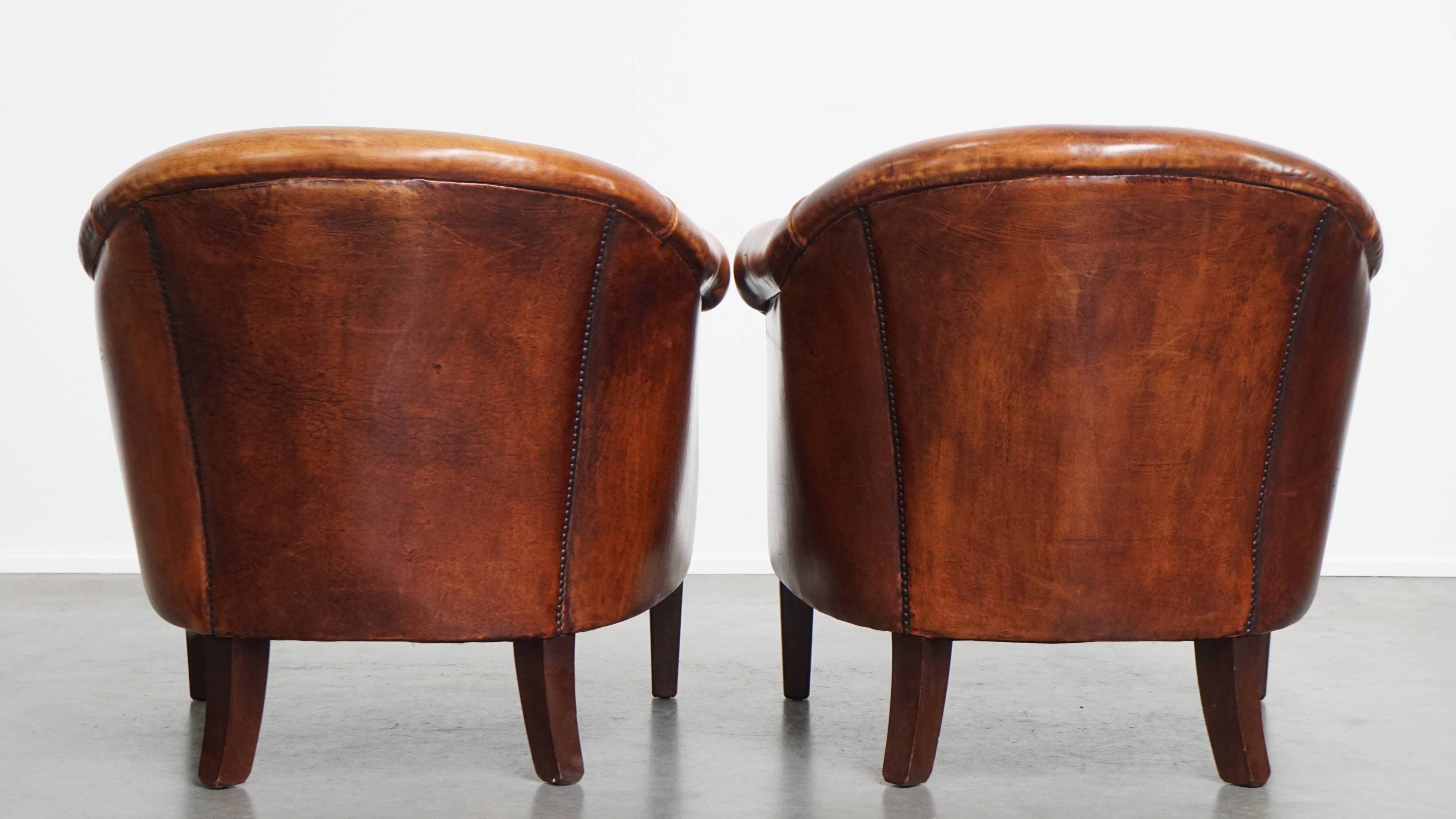 Ensemble de 2 fauteuils club en cuir de mouton