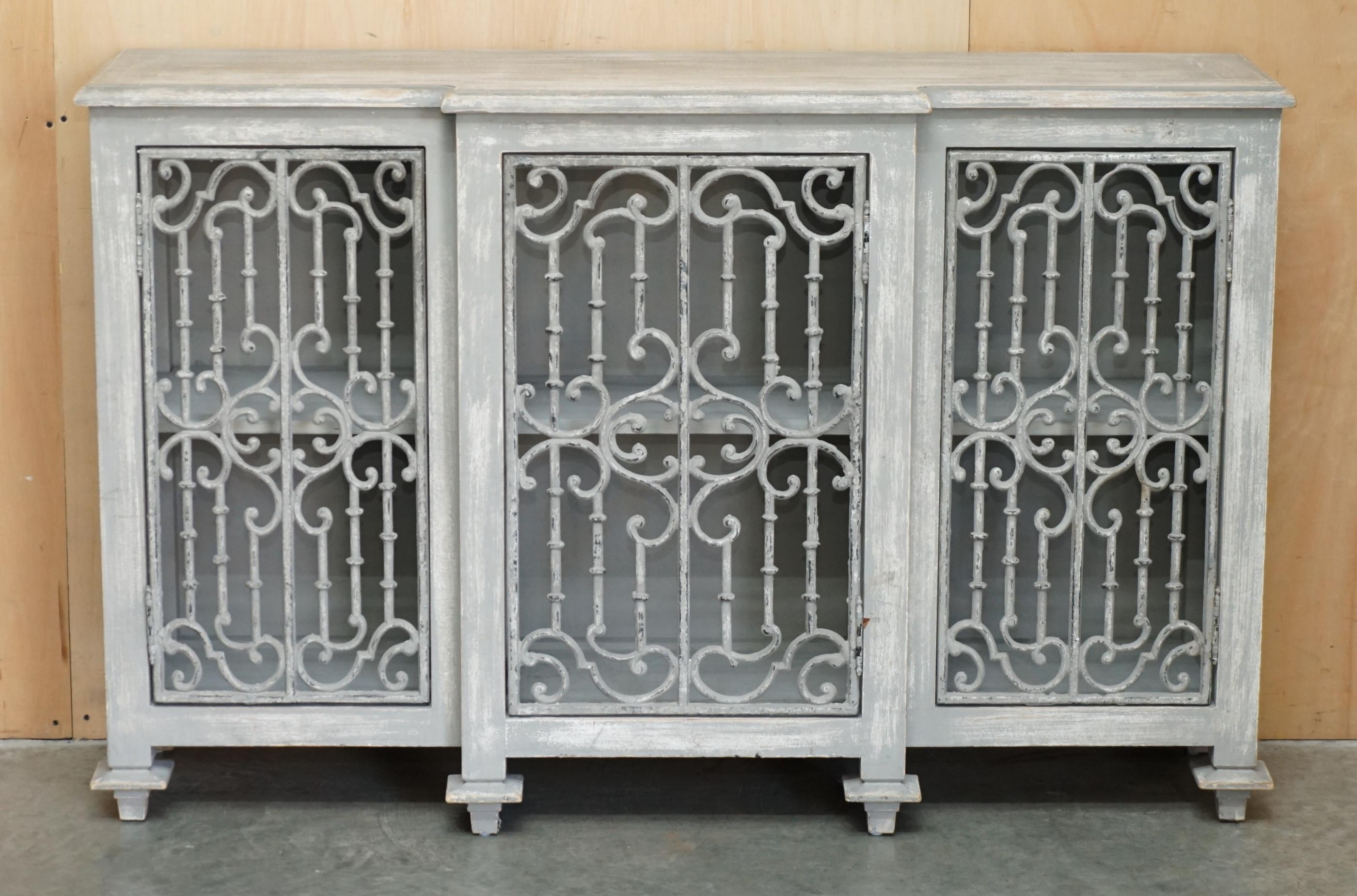 Vintage sideboard with wrought iron doors