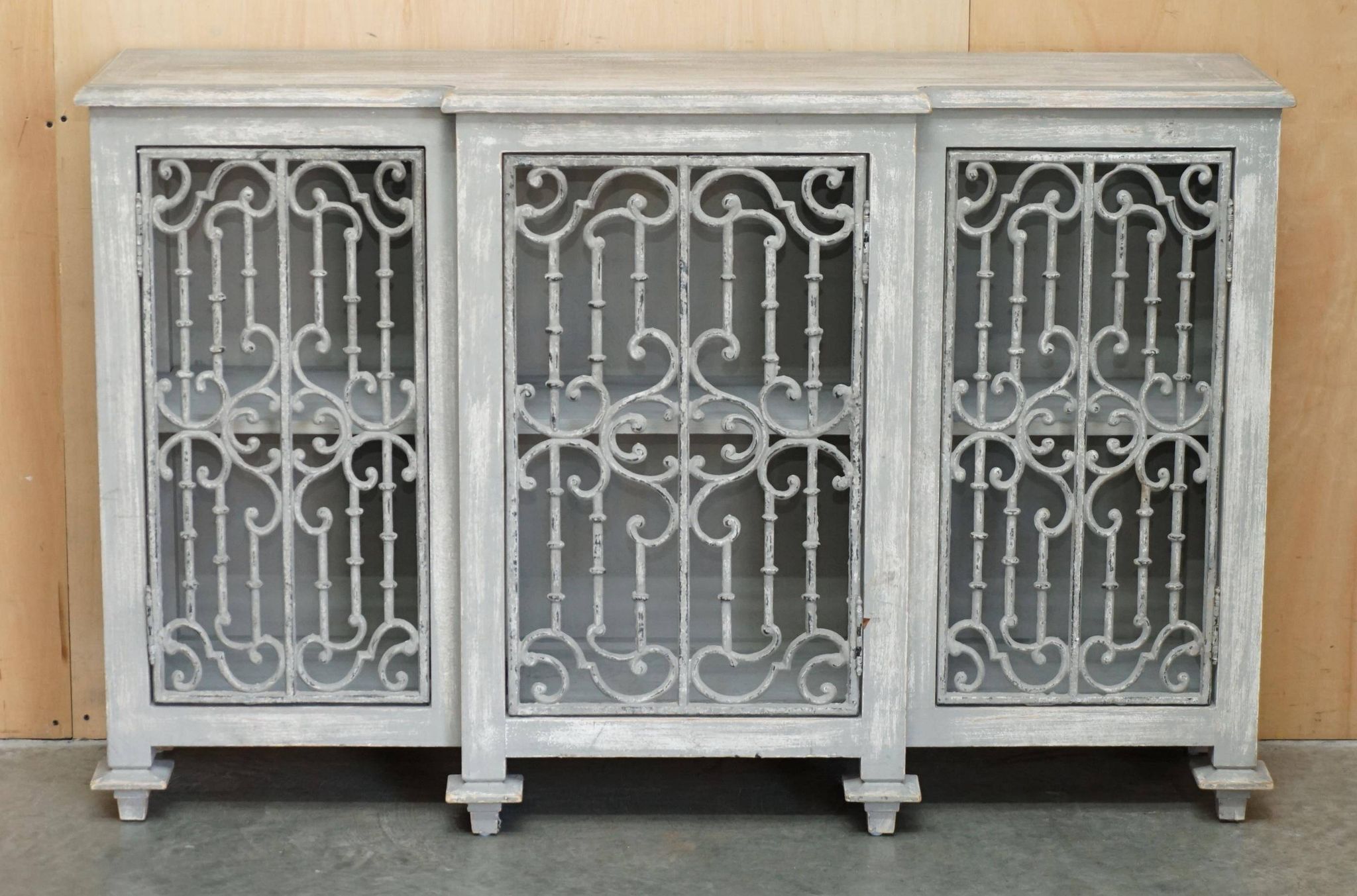 Vintage sideboard with wrought iron doors