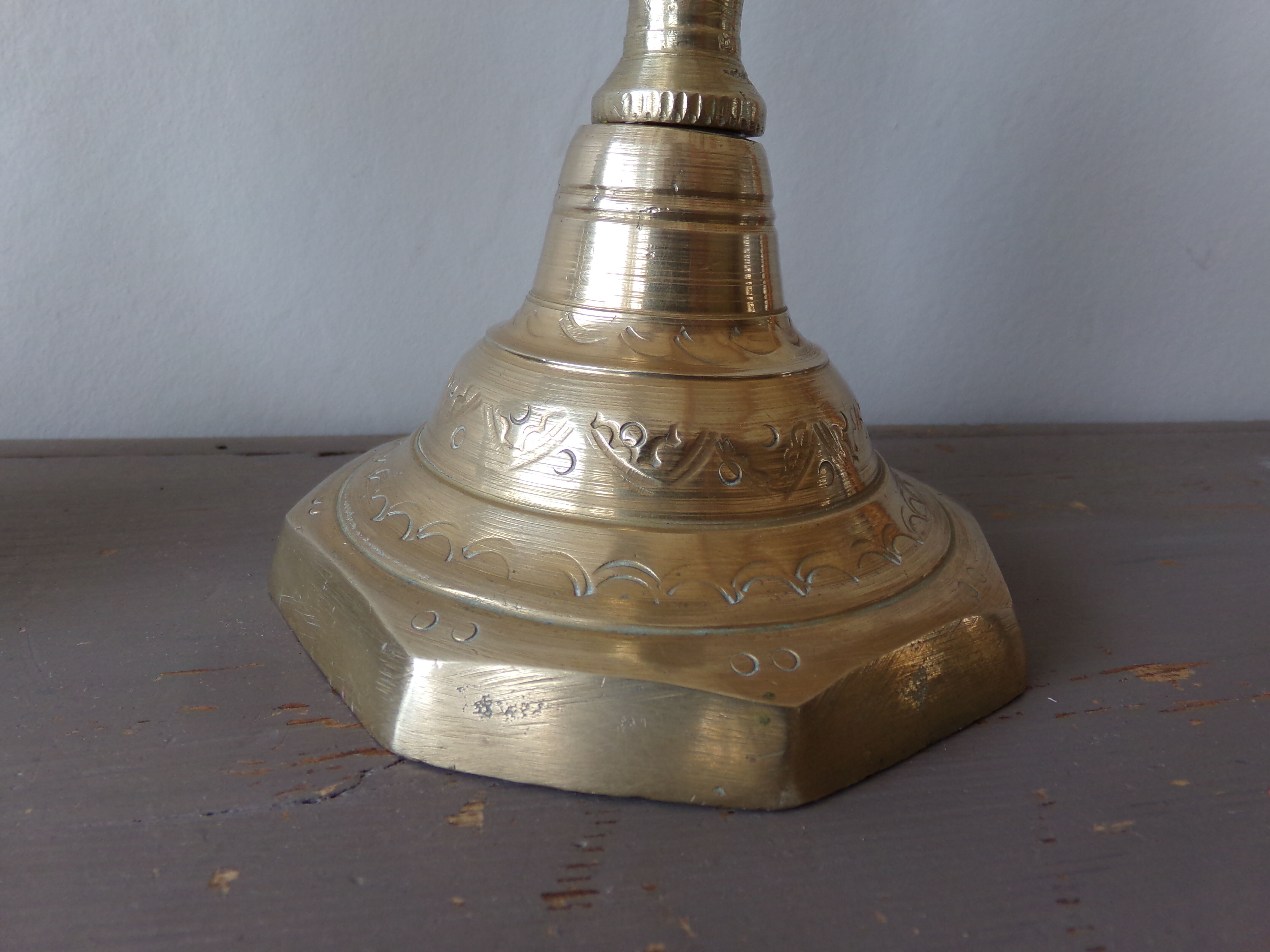 Old candle holder in gilded bronze