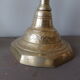 Old candle holder in gilded bronze