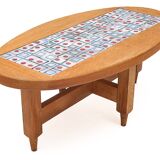 Oval coffee table by Guillerme and Chambron