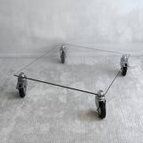 Beautiful designer glass coffee table on wheels
