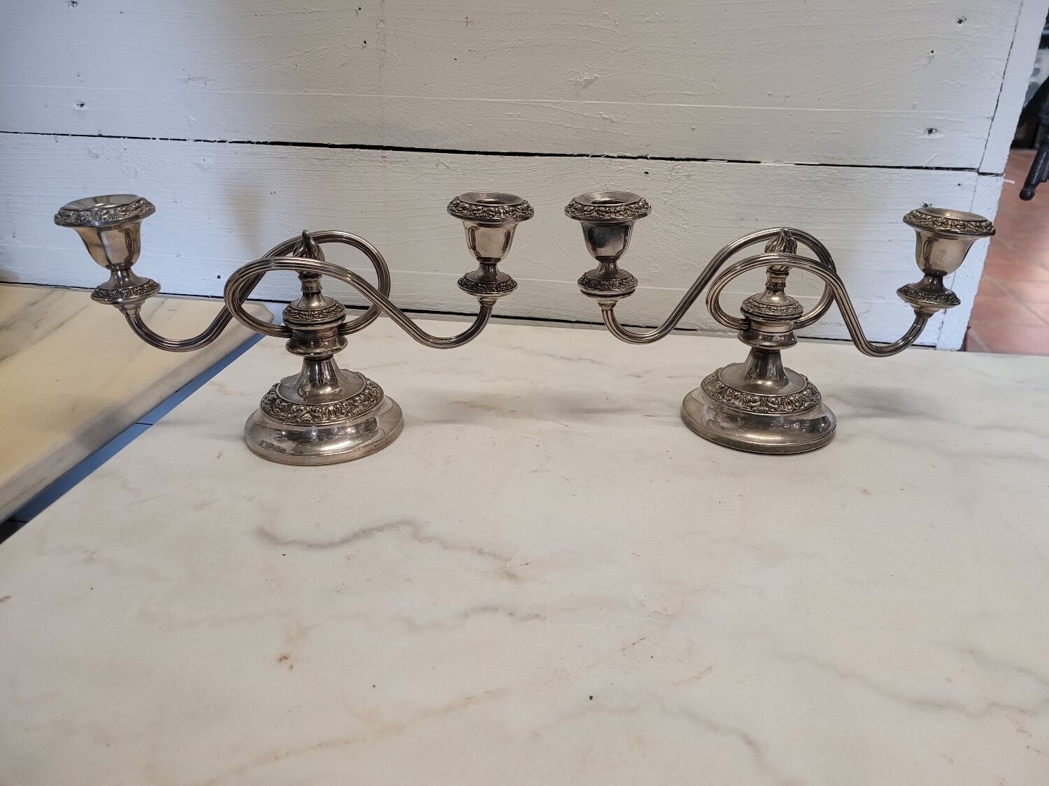 Pair of silver metal candlesticks