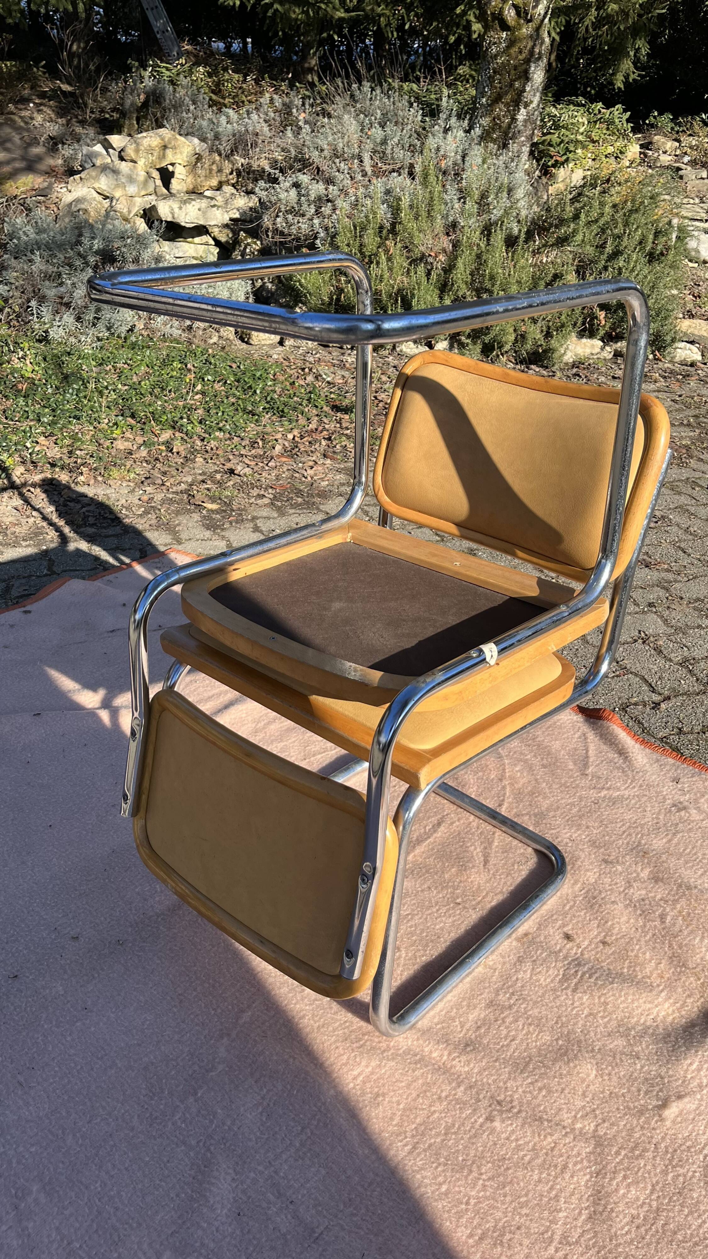 Pair vintage sled reception chairs
