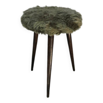 Green wooden tripod stool