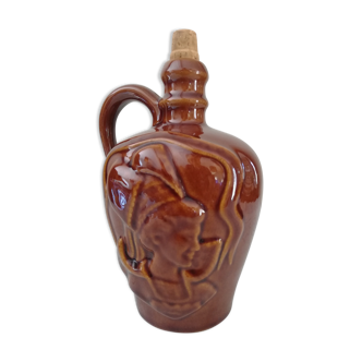 Carved ceramic bottle