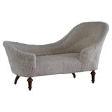 Antique Danish sculptural chaise longue from the 19th century, reupholstered in lambswool.