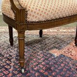 Pair of early 20th century Louis XVI armchairs in walnut