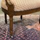 Paire de fauteuils Louis XVI début XXème en noyer