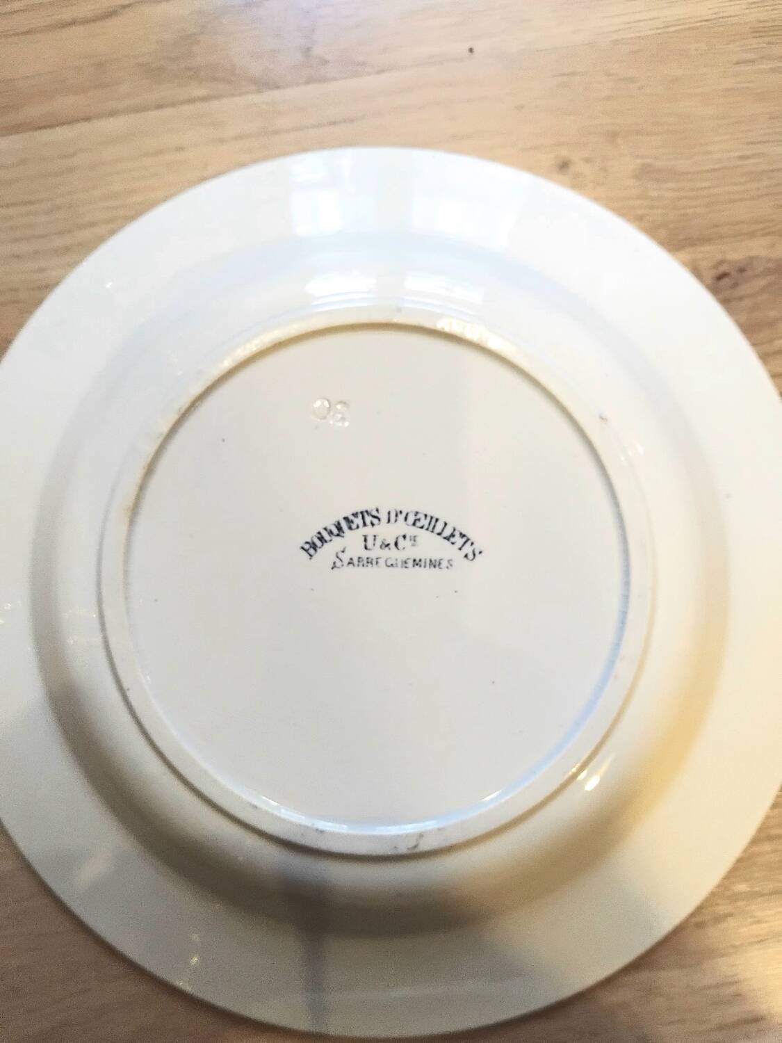 Set of 4 mismatched blue Terre de Fer soup plates