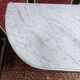 Louis XVI style half-moon console with veined white marble and drawer