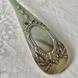 Large old ladle in silver metal, medallion baguette model