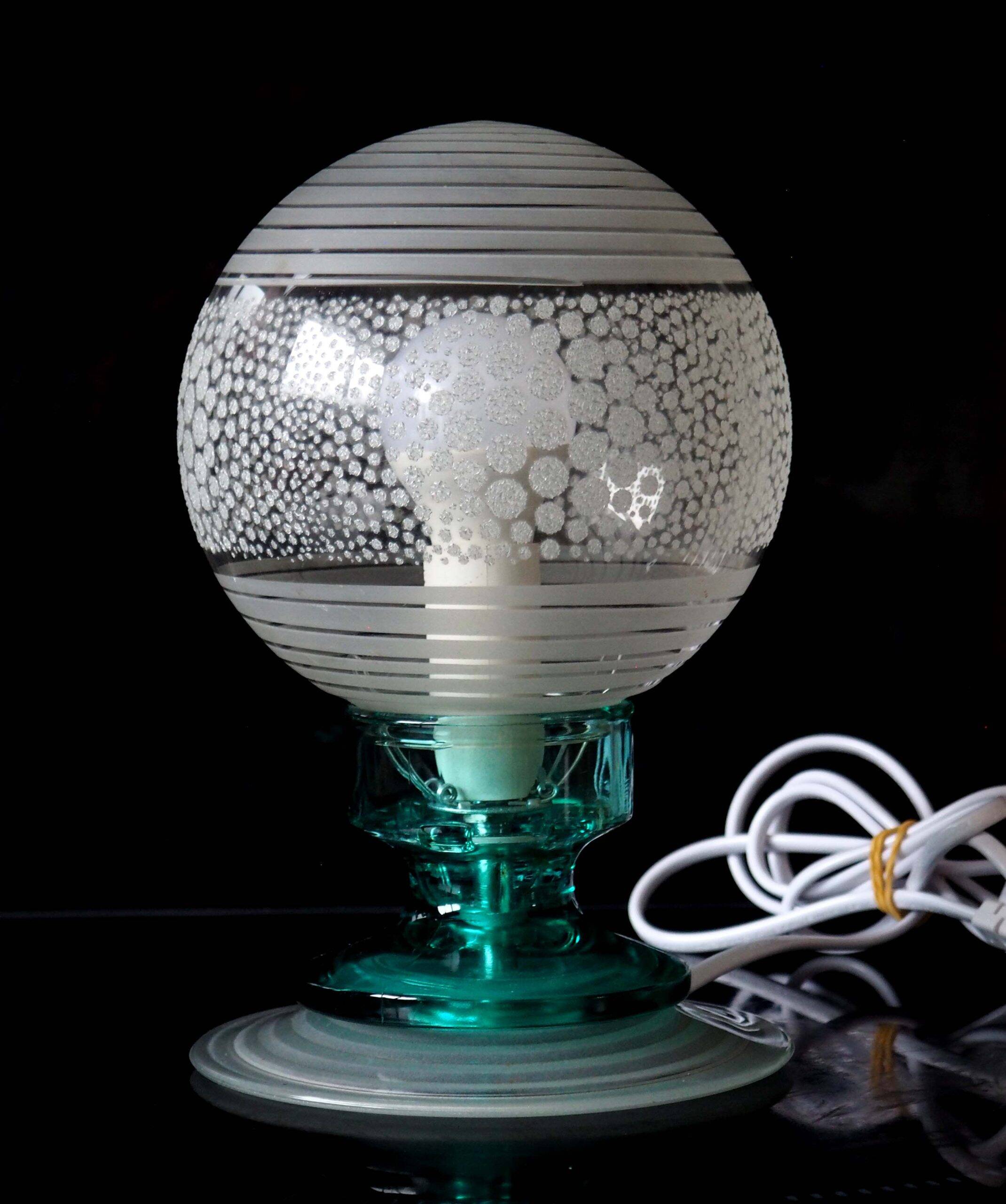Frosted globe lamp and turquoise glass