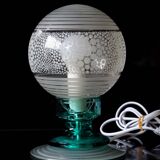 Frosted globe lamp and turquoise glass