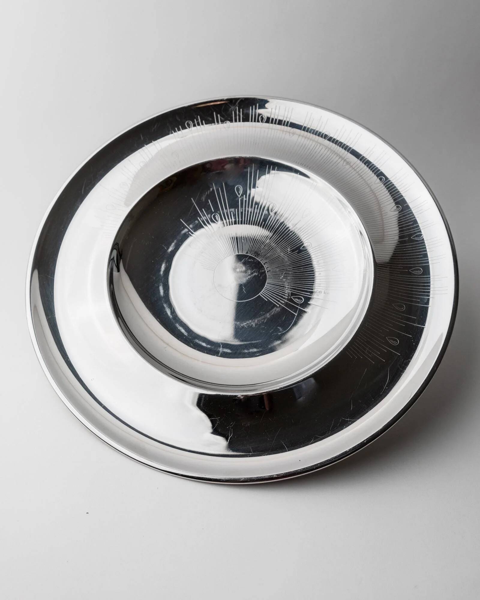 Vintage stainless steel bowl from the 1980s, polished metal with a finely textured surface, timeless elegant design, retro table decoration, noble gift idea.