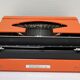 Silver Reed 200 orange metal typewriter made in Japan 70s