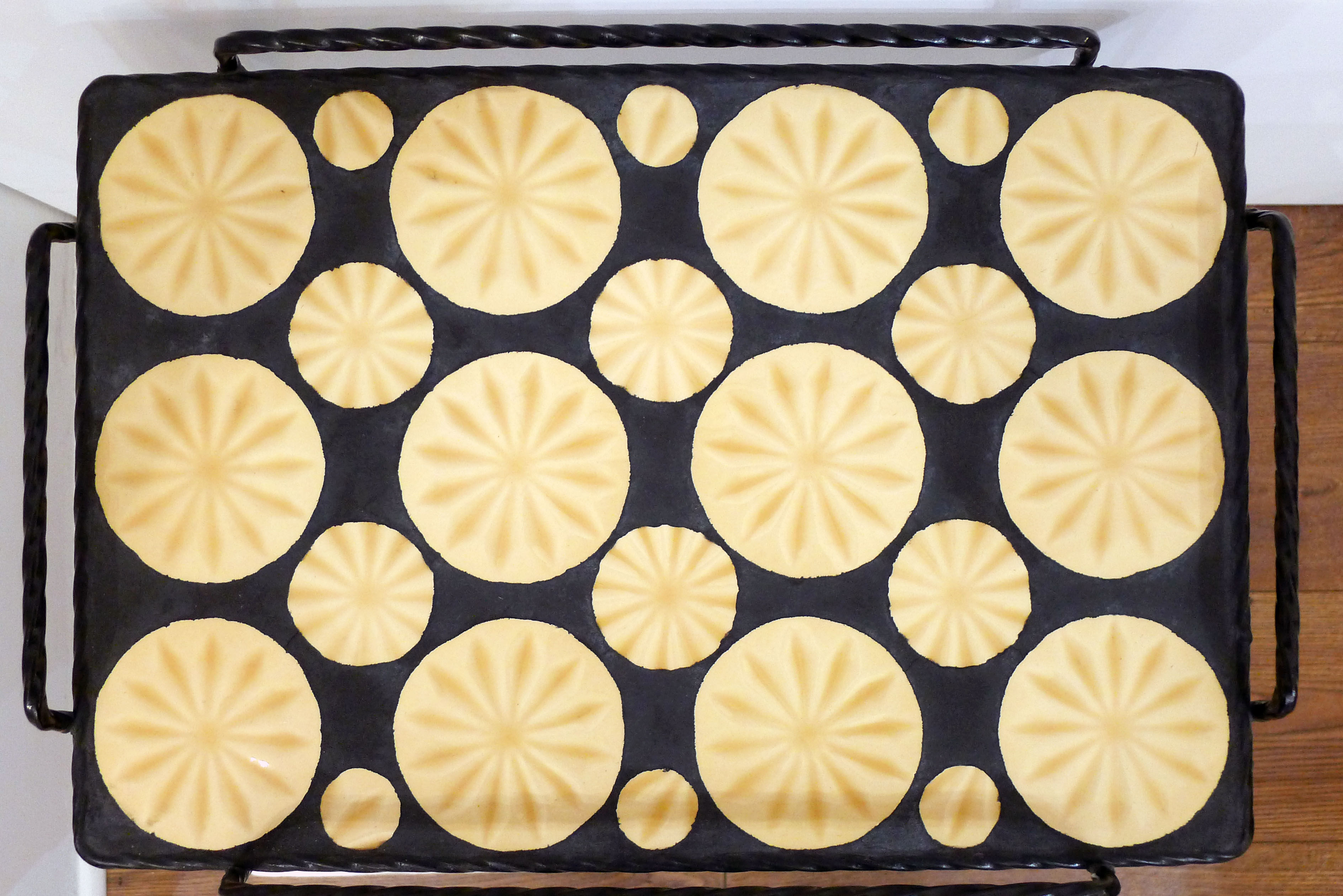 Mosaic and wrought iron side table, compass feet