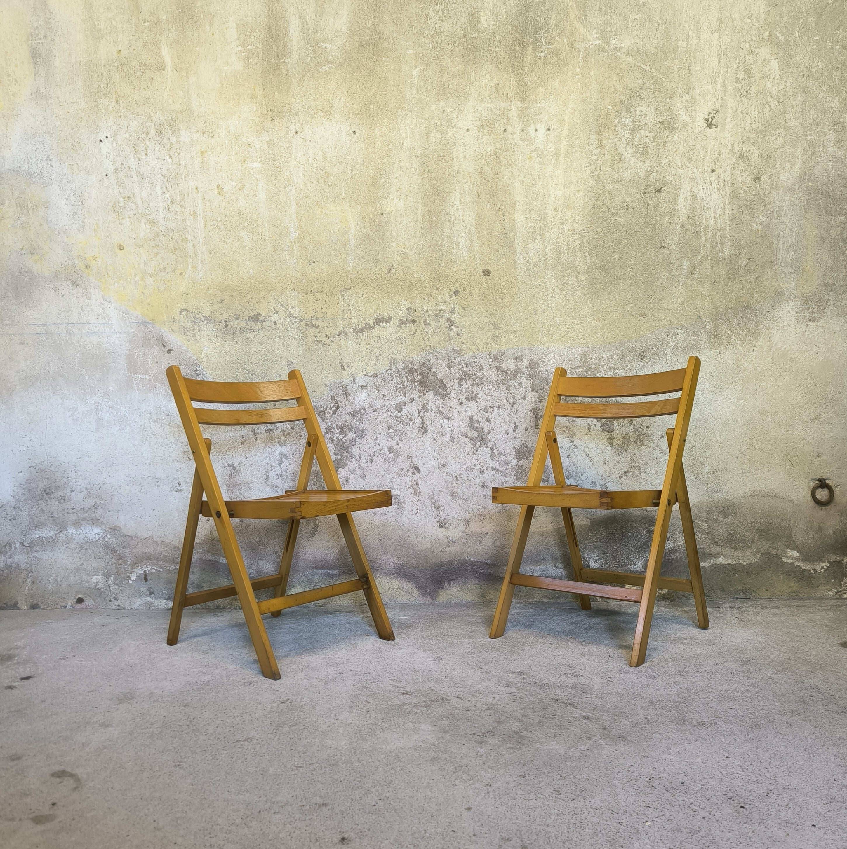 Pair of vintage folding wooden chairs