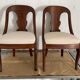 Two mahogany Empire Gondola chairs