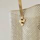 Mid-century umbrella stand in patinated brass and perforated metal, 1950s.