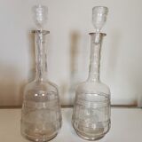 Pair of antique moulded glass decanters