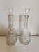 Pair of antique moulded glass carafes